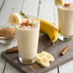 Creamy banana smoothie topped with cinnamon, perfect for a banana weight loss smoothie recipe